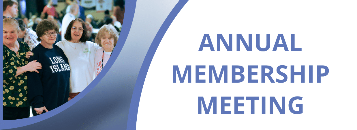 Smiling group of attendees on the left of an annual membership meeting banner with blue curved design on the right side.