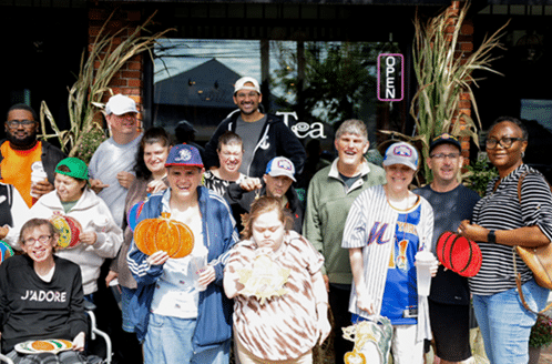 People supported by Day Services stand outside BesTea