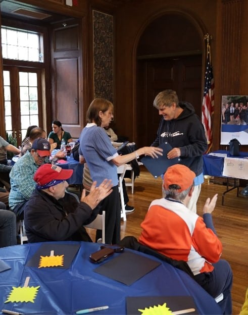 Attendees at the rights rally in the Brookville Mansion